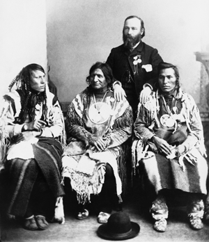 Picture of Jean L’Heureux circa 1880 with three Blackfoot Confederacy chiefs